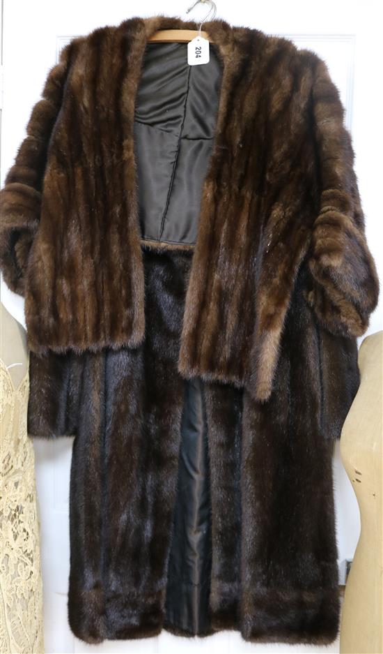 A dark brown mink coat and an evening sleeved mink stole